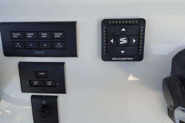 Slide: The Image of Control panel of 2024 Key West 263 FS boat with Yamaha and Seakeeper systems. - 20