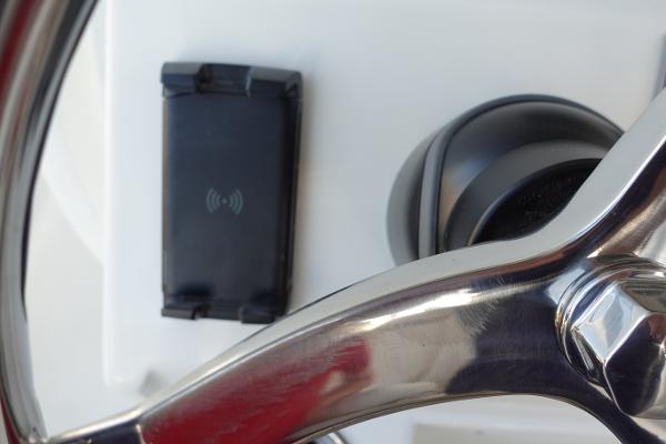 Slide: The Image of Close-up of 2024 Key West 263 FS boat steering wheel and control panel. - 23