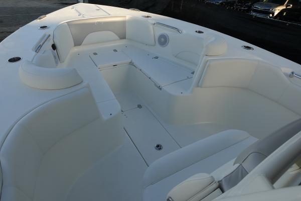 Slide: The Image of 2024 Key West 263 FS boat interior with spacious seating and storage compartments. - 24