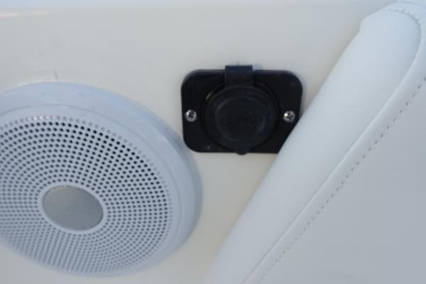 Slide: The Image of Close-up of speaker and outlet on 2024 Key West 263 FS boat. - 25