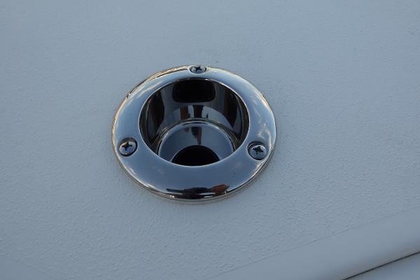 Slide: The Image of Close-up of a 2024 Key West 263 FS boat's stainless steel rod holder. - 27