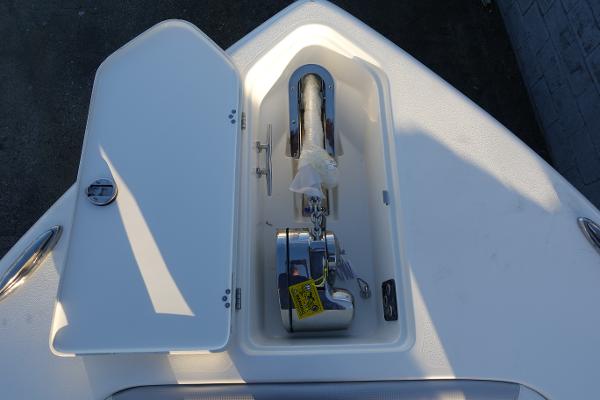 Slide: The Image of Anchor compartment of 2024 Key West 263 FS boat with open hatch. - 28