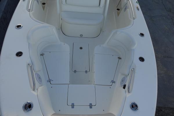 Slide: The Image of 2024 Key West 263 FS boat interior with seating and storage compartments. - 30