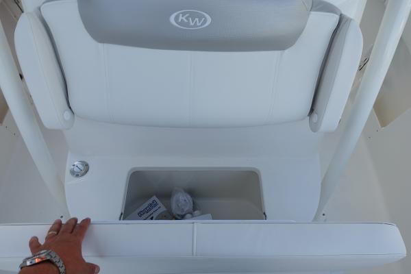 Slide: The Image of 2024 Key West 263 FS boat seat with storage compartment. - 32