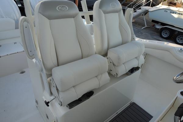 Slide: The Image of 2024 Key West 263 FS boat with dual white captain's chairs. - 35
