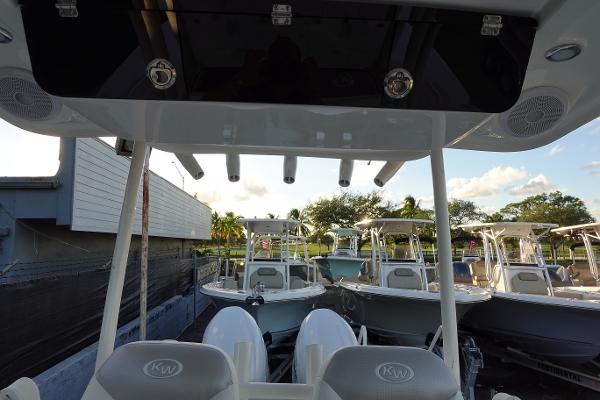 Slide: The Image of 2024 Key West 263 FS boats displayed at a marina. - 37