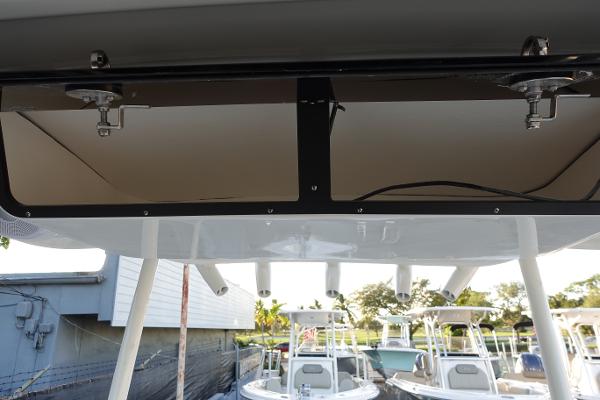 Slide: The Image of 2024 Key West 263 FS boat with overhead storage compartments. - 39