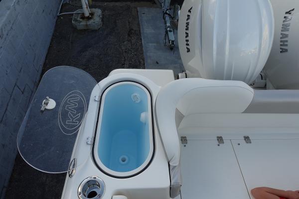 Slide: The Image of 2024 Key West 263 FS boat with Yamaha engine and livewell. - 40