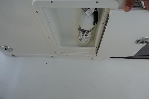 Slide: The Image of 2024 Key West 263 FS boat fire extinguisher compartment. - 42