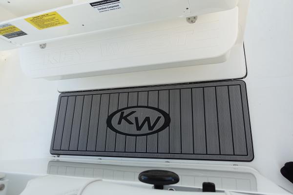 Slide: The Image of 2024 Key West 263 FS boat deck with KW logo mat. - 43