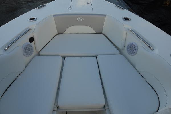Slide: The Image of 2024 Key West 263 FS boat with cushioned seating area. - 49