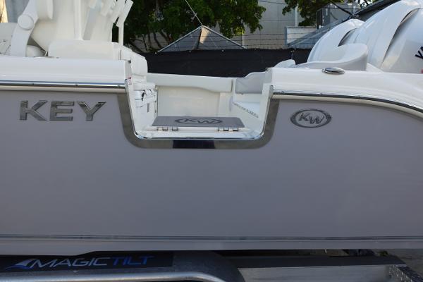 Slide: The Image of 2024 Key West 263 FS boat on a Magic Tilt trailer. - 5