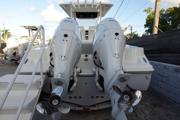 Slide: The Image of 2024 Key West 263 FS boat with twin outboard engines. - 6