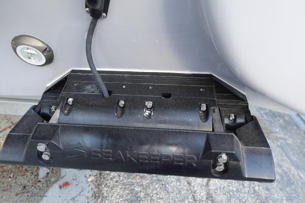 Slide: The Image of 2024 Key West 263 FS boat with Seakeeper stabilization system. - 9