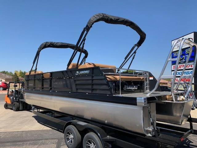 Slide: The Image of 2024 Landau Atlantis 250 Swingback Rear Lounge Tri-Log pontoon boat on trailer. - 3