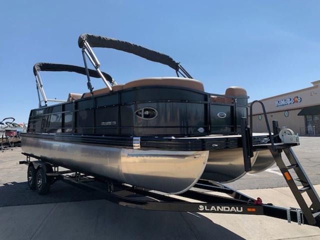 Slide: The Image of 2024 Landau Atlantis 250 Swingback Rear Lounge Tri-Log pontoon boat on trailer. - 7