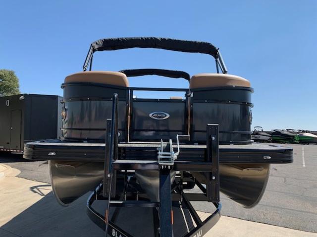 Slide: The Image of 2024 Landau Atlantis 250 Swingback Rear Lounge Tri-Log pontoon boat on trailer. - 8