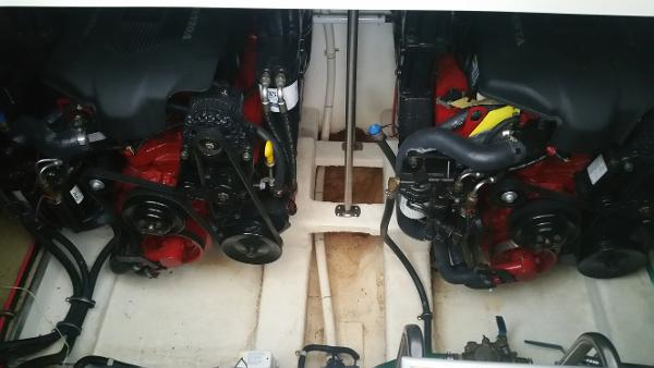Slide: The Image of Engine compartment of a 2003 Larson 330 CABRIO boat. - 13