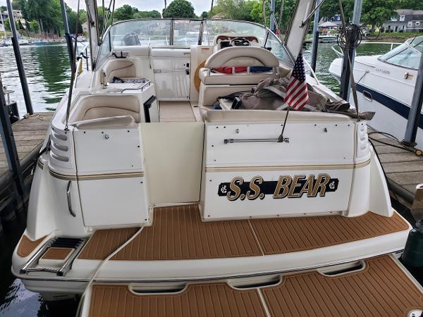 Slide: The Image of 2003 Larson 330 CABRIO boat named S.S. BEAR docked at a marina. - 14