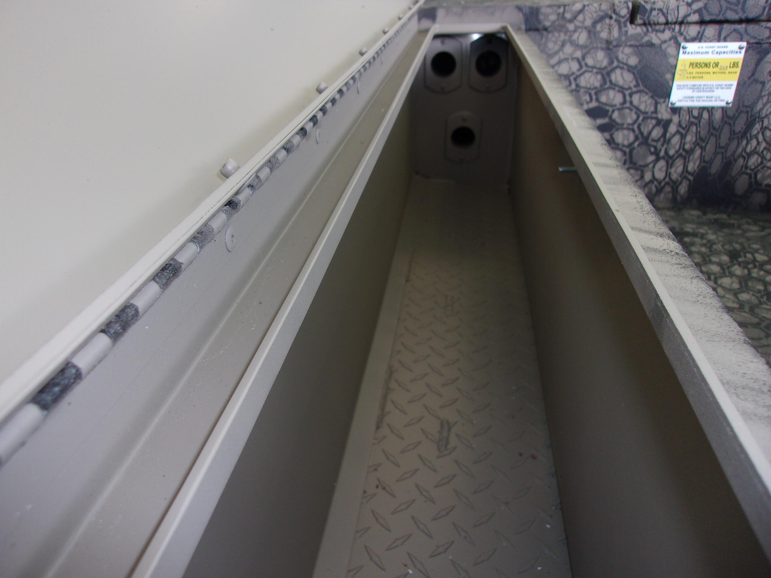 Slide: The Image of 2023 Legendcraft Boats Ambush Elite 1656 interior storage compartment. - 10