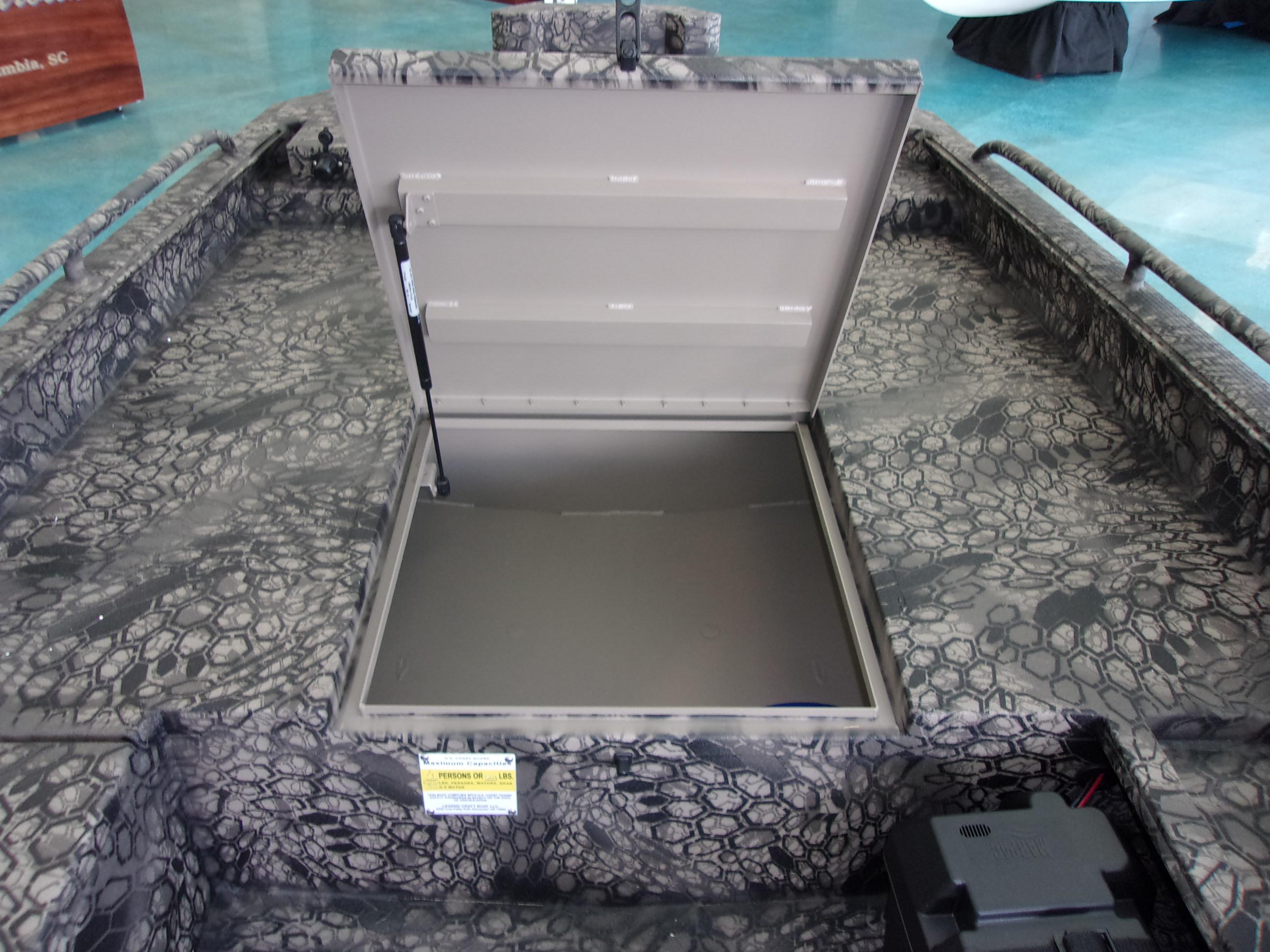Slide: The Image of 2023 Legendcraft Boats Ambush Elite 1656 interior storage compartment. - 11