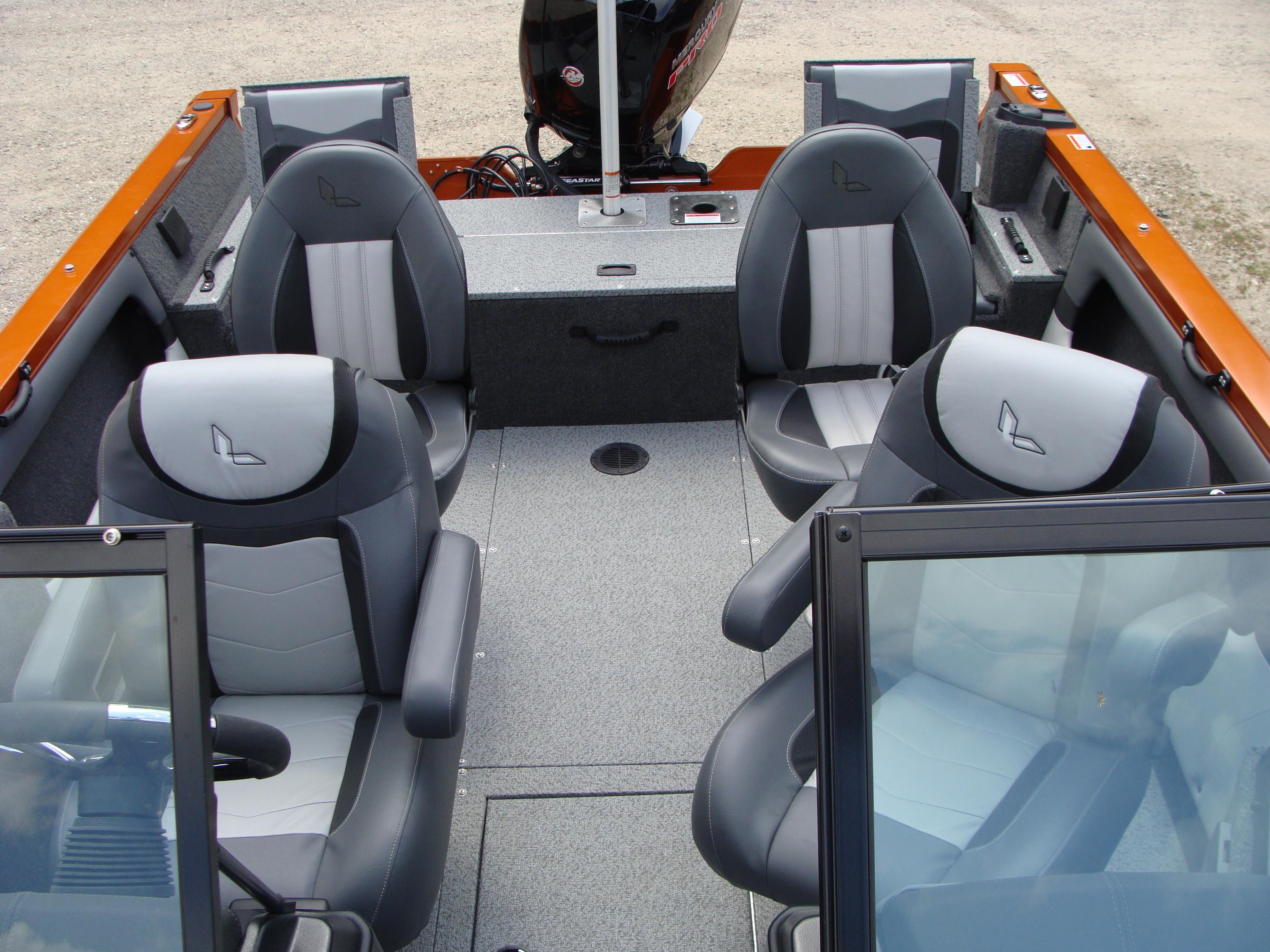 Slide: The Image of 2023 Lowe FS 1900 boat interior with four gray and black seats. - 2