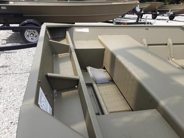Slide: The Image of 2024 Lowe Jon L1648M boat interior, showing seating and storage compartments. - 4