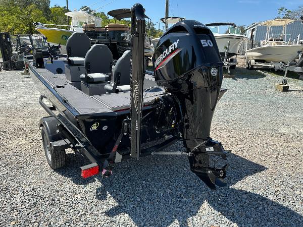 Slide: The Image of 2022 Lowe Skorpion 16 boat with Mercury 50 outboard motor in a marina. - 10