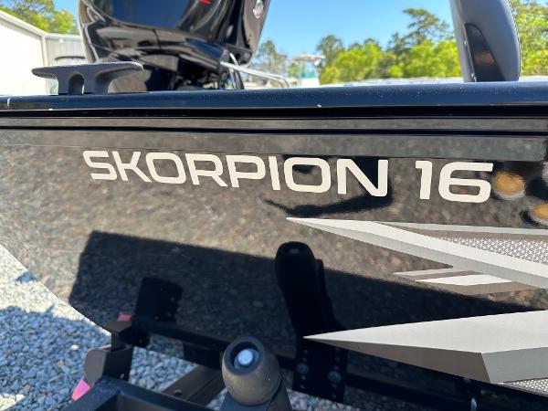 Slide: The Image of 2022 Lowe Skorpion 16 boat side view with model name. - 19