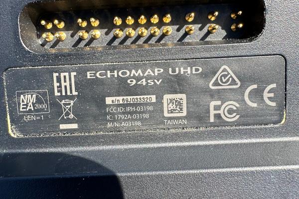 Slide: The Image of Label on Garmin ECHOMAP UHD 94sv device with serial and certification details. - 24