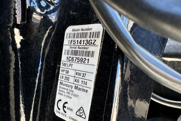 Slide: The Image of Close-up of a 2022 Lowe Skorpion 16 model number and serial number label. - 27