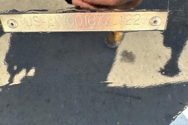 Slide: The Image of 2022 Lowe Skorpion 16 boat identification number plate. - 28