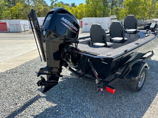 Slide: The Image of 2022 Lowe Skorpion 16 boat with Mercury 50 HP engine, parked on gravel. - 8