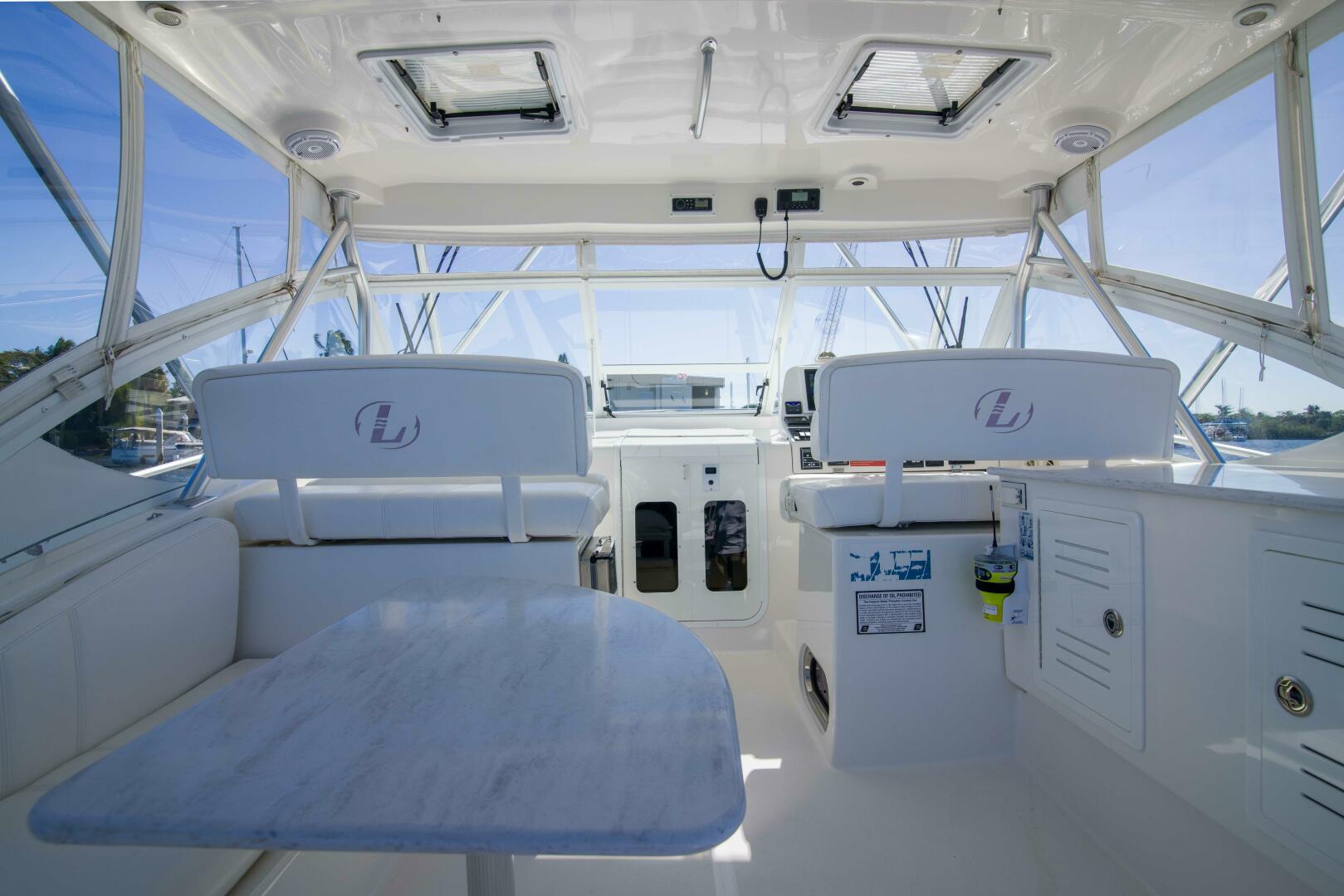 Slide: The Image of Luhrs 37 Date Night Keeping It Reel - Exterior Helm 2010 Luhrs 37 Canyon Express Keeping It Reel Date Night - 5271367