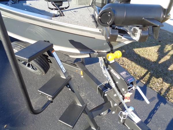 Slide: The Image of 2024 Lund 1875 Pro Guide boat on trailer with winch and steps. - 26