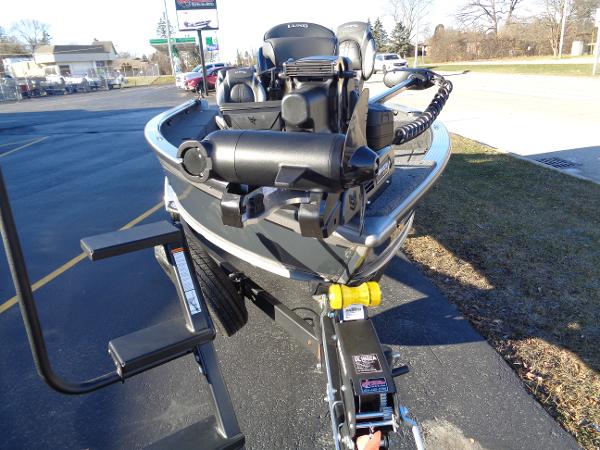 Slide: The Image of 2024 Lund 1875 Pro Guide fishing boat on a trailer, front view. - 27