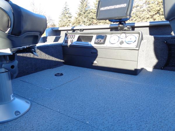 Slide: The Image of 2024 Lund 1875 Pro Guide boat interior with Humminbird electronics and seating. - 33