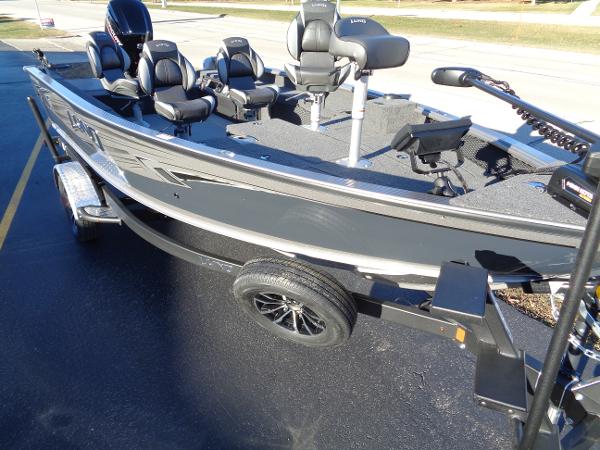 Slide: The Image of 2024 Lund 1875 Pro Guide fishing boat on trailer. - 4