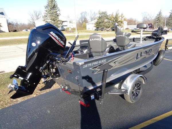 Slide: The Image of 2024 Lund 1875 Pro Guide fishing boat with Mercury outboard motor. - 6
