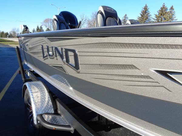 Slide: The Image of 2024 Lund 1875 Pro Guide fishing boat on trailer, side view. - 7