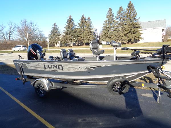 Slide: The Image of 2024 Lund 1875 Pro Guide fishing boat on a trailer. - 8