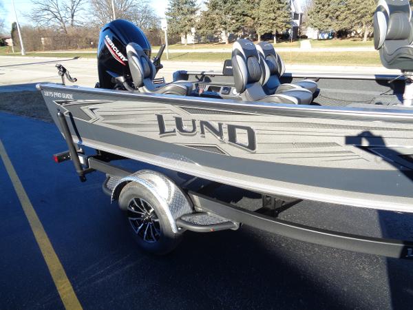 Slide: The Image of 2024 Lund 1875 Pro Guide fishing boat on trailer. - 9
