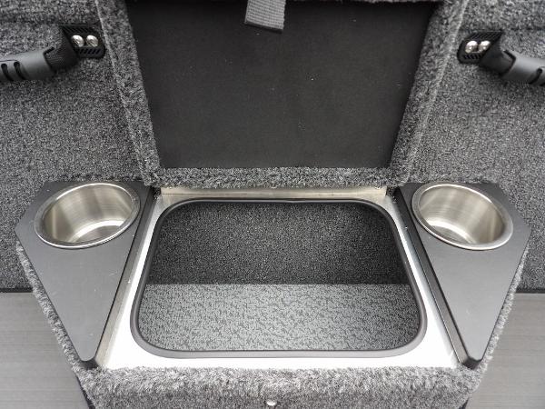 Slide: The Image of 2024 Lund 2075 Pro-V Bass XS boat storage compartment with cup holders. - 18