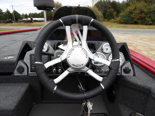 Slide: The Image of 2024 Lund 2075 Pro-V Bass XS boat steering wheel and dashboard. - 19