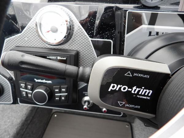 Slide: The Image of 2024 Lund 2075 Pro-V Bass XS boat dashboard with Pro-Trim control and Rockford Fosgate audio system. - 20