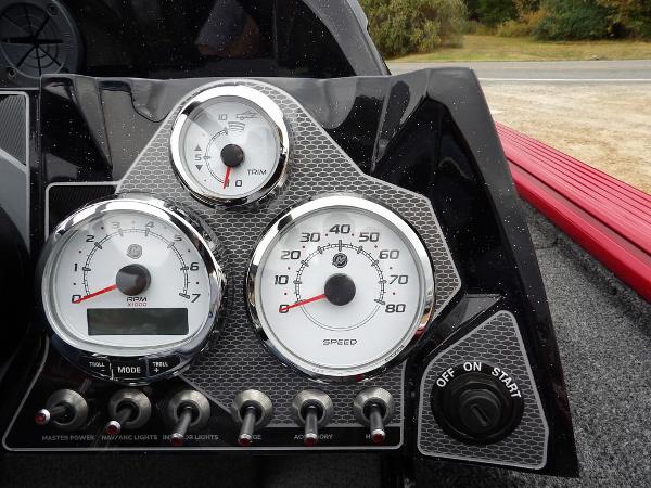 Slide: The Image of Dashboard of 2024 Lund 2075 Pro-V Bass XS boat with speedometer and RPM gauges. - 23