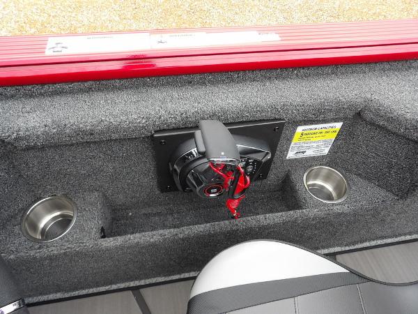 Slide: The Image of 2024 Lund 2075 Pro-V Bass XS boat interior with cup holders and control panel. - 26