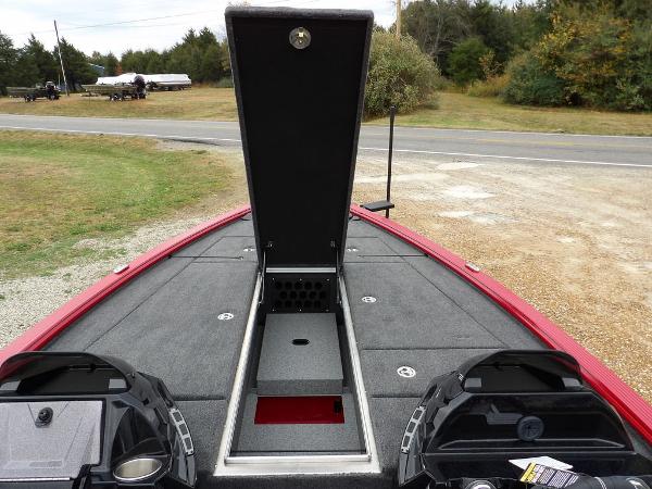 Slide: The Image of 2024 Lund 2075 Pro-V Bass XS boat with open storage compartment. - 30