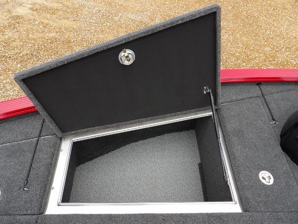 Slide: The Image of Open storage compartment on 2024 Lund 2075 Pro-V Bass XS boat. - 34