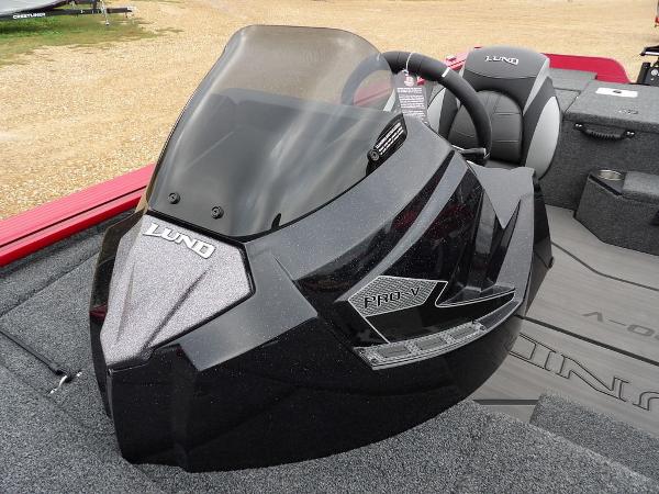 Slide: The Image of 2024 Lund 2075 Pro-V Bass XS boat console and steering wheel. - 36